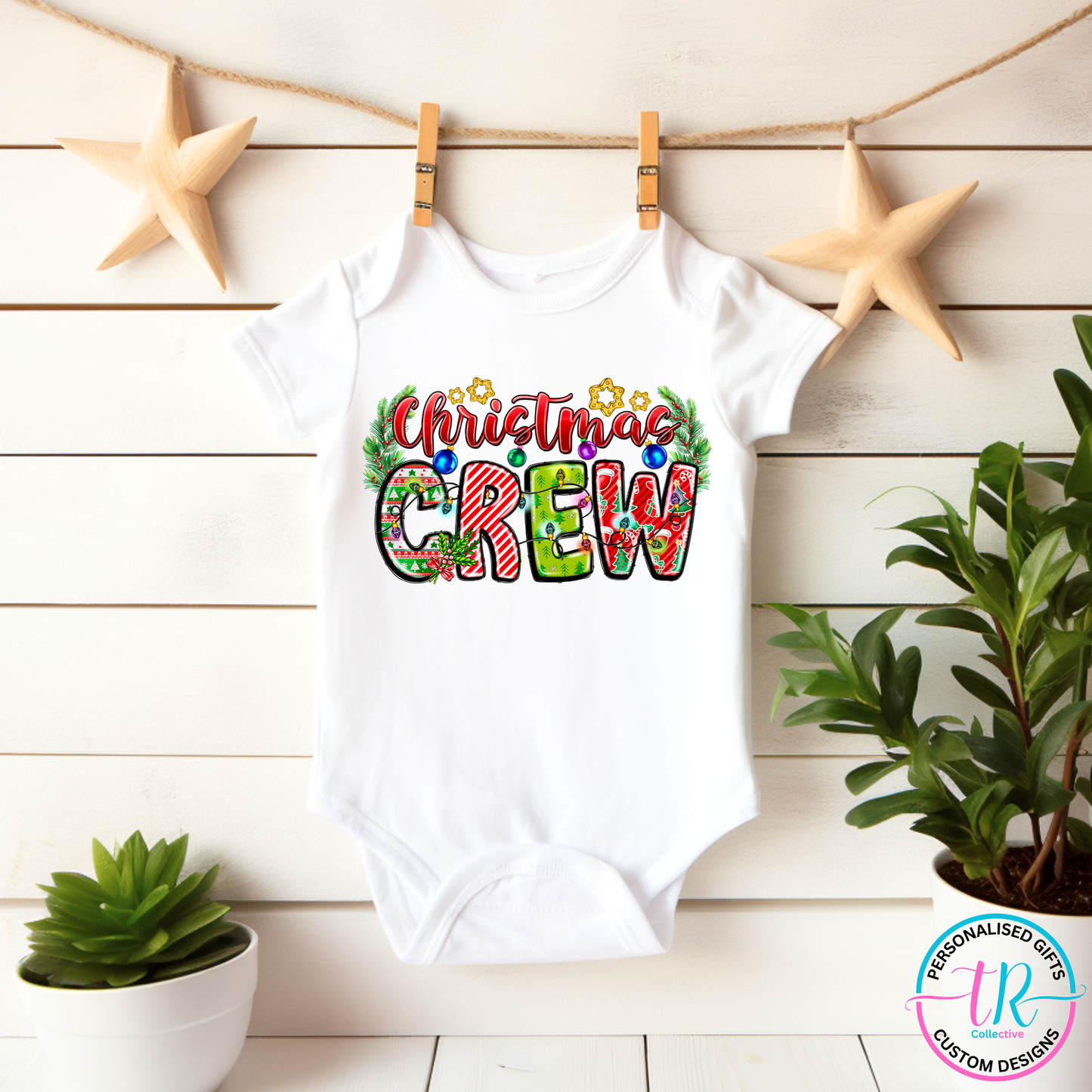 Baby-christmas-onesie-christmas-onesies-christmas-crew-tr-collective.front