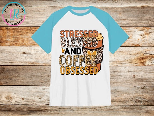 t-shirt-graphic-tees-shirts-coffee-obsessed-light-blue-sleeve-TR-collective-frontLargeMedium